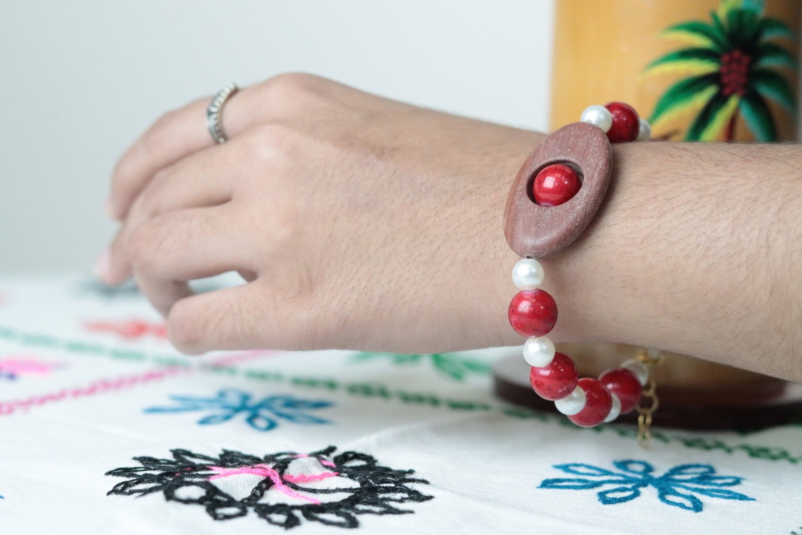Ruby Wood-Tone Charm Bracelet