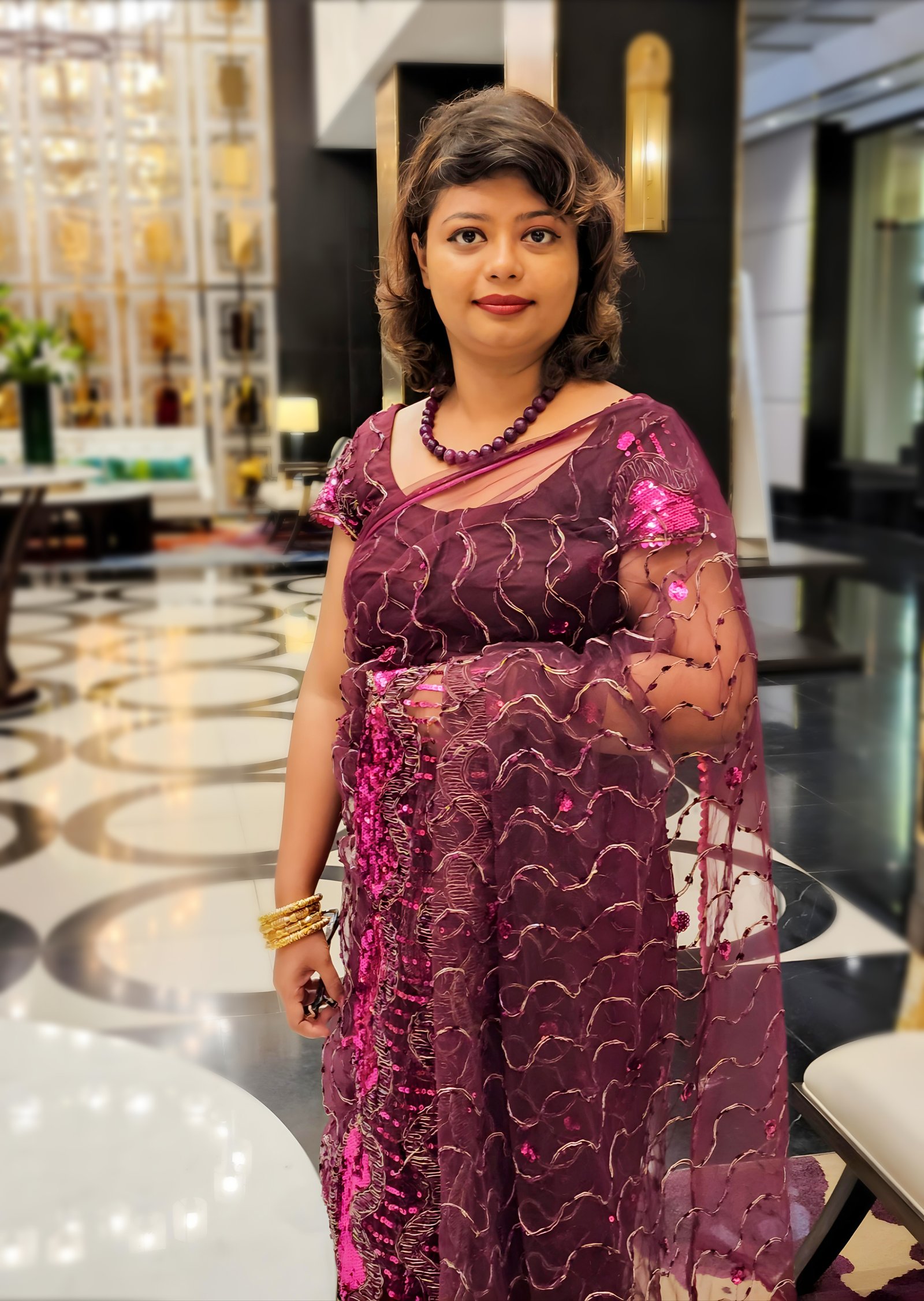 বেগুনি সিকুইন নেট শাড়ি